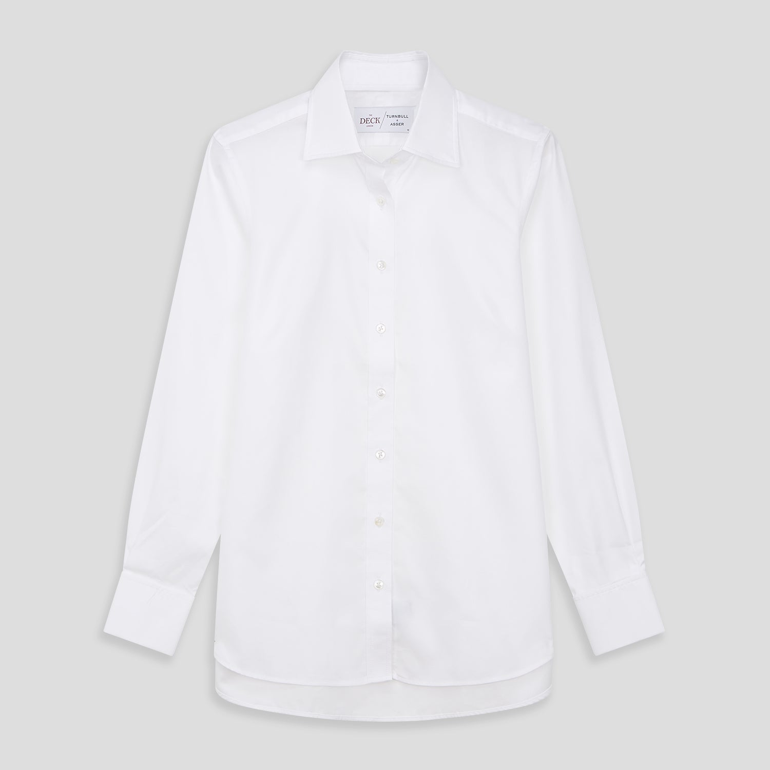 View 1 of product The Turnbull and The Deck White Cotton Traditionalist Shirt by Turnbull & Asser features a classic collar, buttoned front and cuffs, and a refined Royal Oxford weave, shown on a plain light gray background.