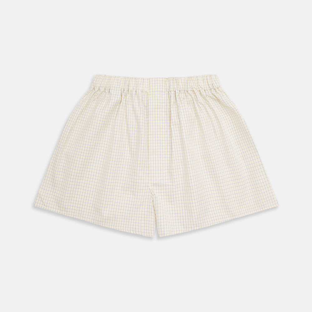 Turnbull & Asser’s Yellow and Blue Check Cotton RE-PURPOSE Godfrey Boxers are crafted from recycled fabric, featuring a yellow and blue check pattern, an elastic waistband, and shown on a plain white background.