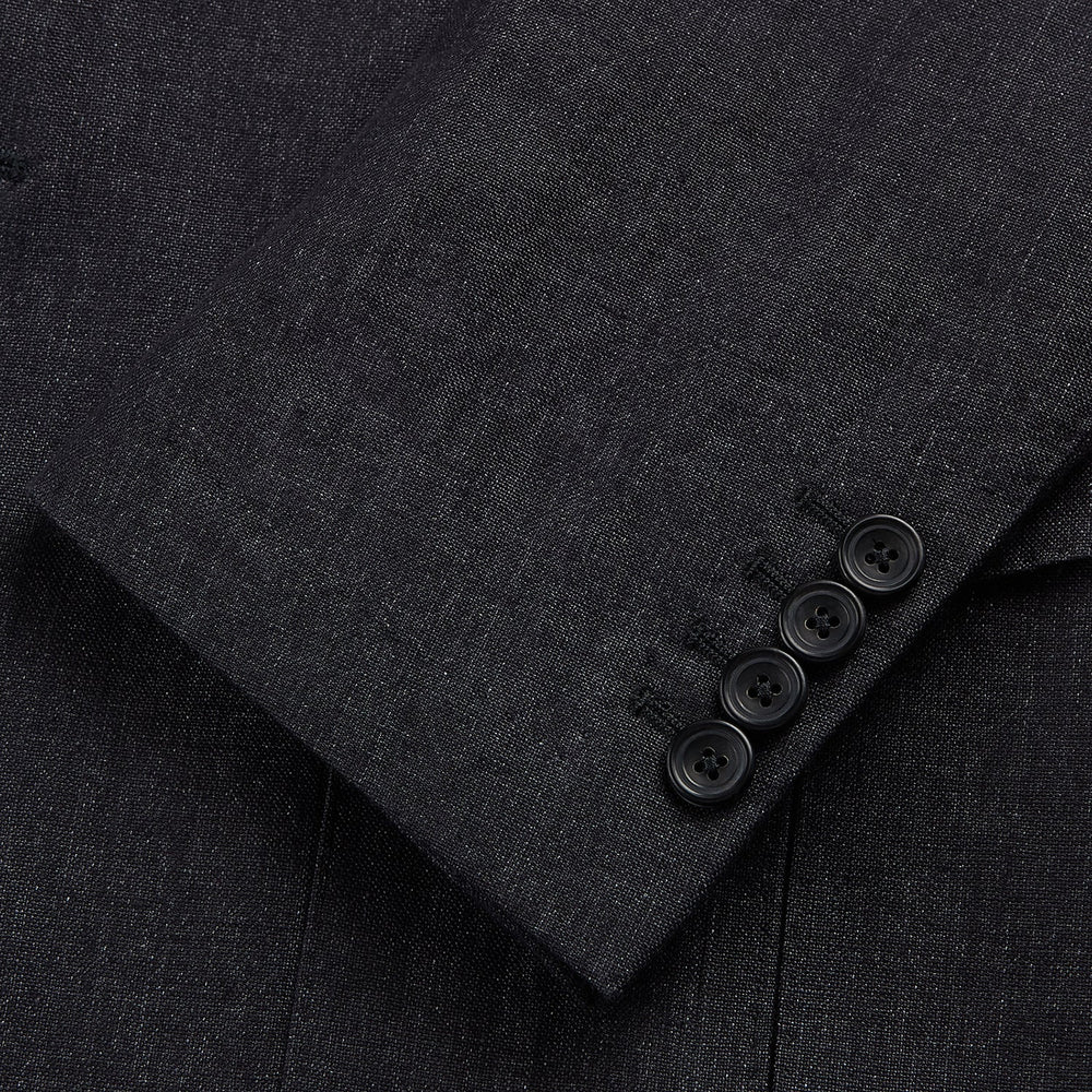 The Turnbull & Asser Charcoal Linen Safari Byron Jacket has a contemporary fit, notched lapel, front button closure, and four flap pockets—two chest and two waist—shown on a plain white background.