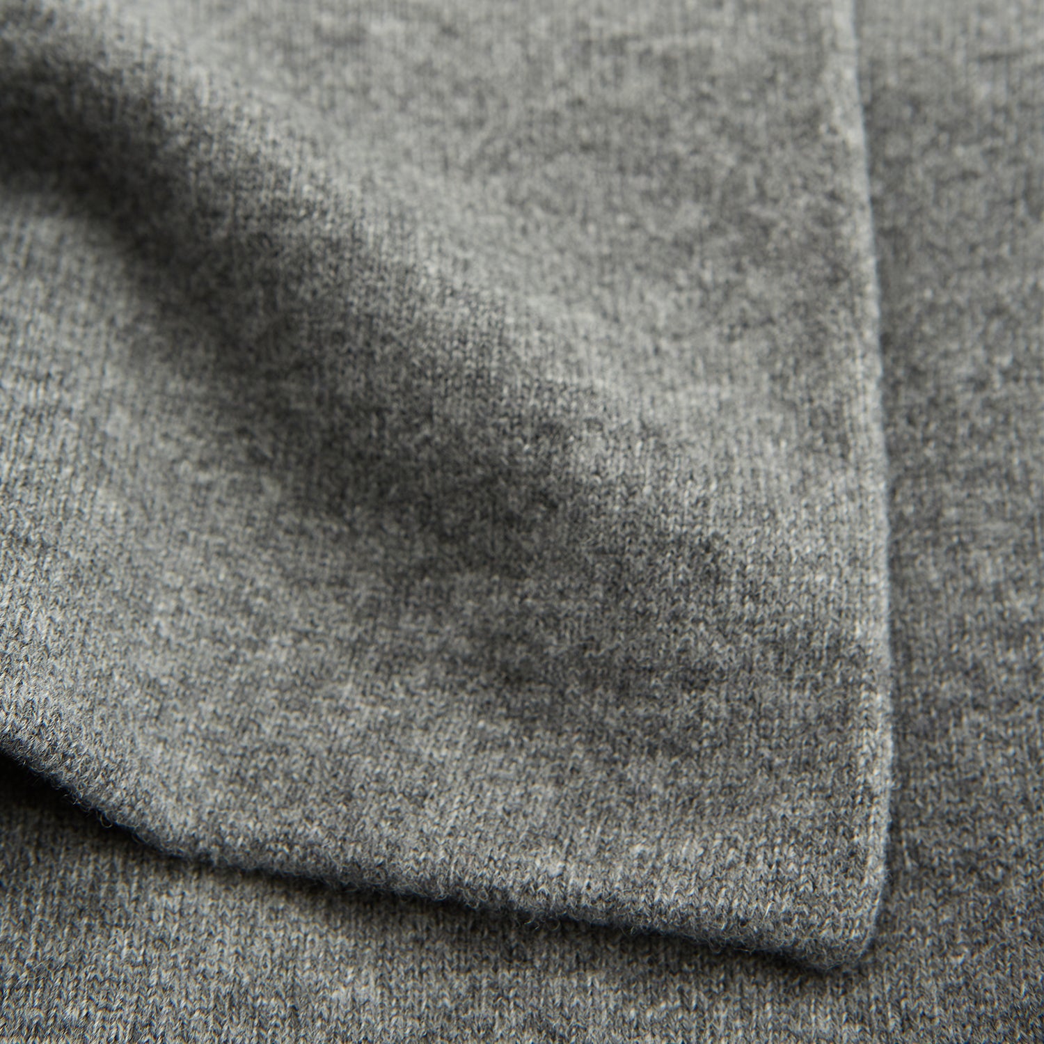 View 6 of product The Pale Blue Wool and Cashmere Lily Blanket by Turnbull & Asser features abstract, hand-drawn designs in blue, yellow, and gray on a white background.