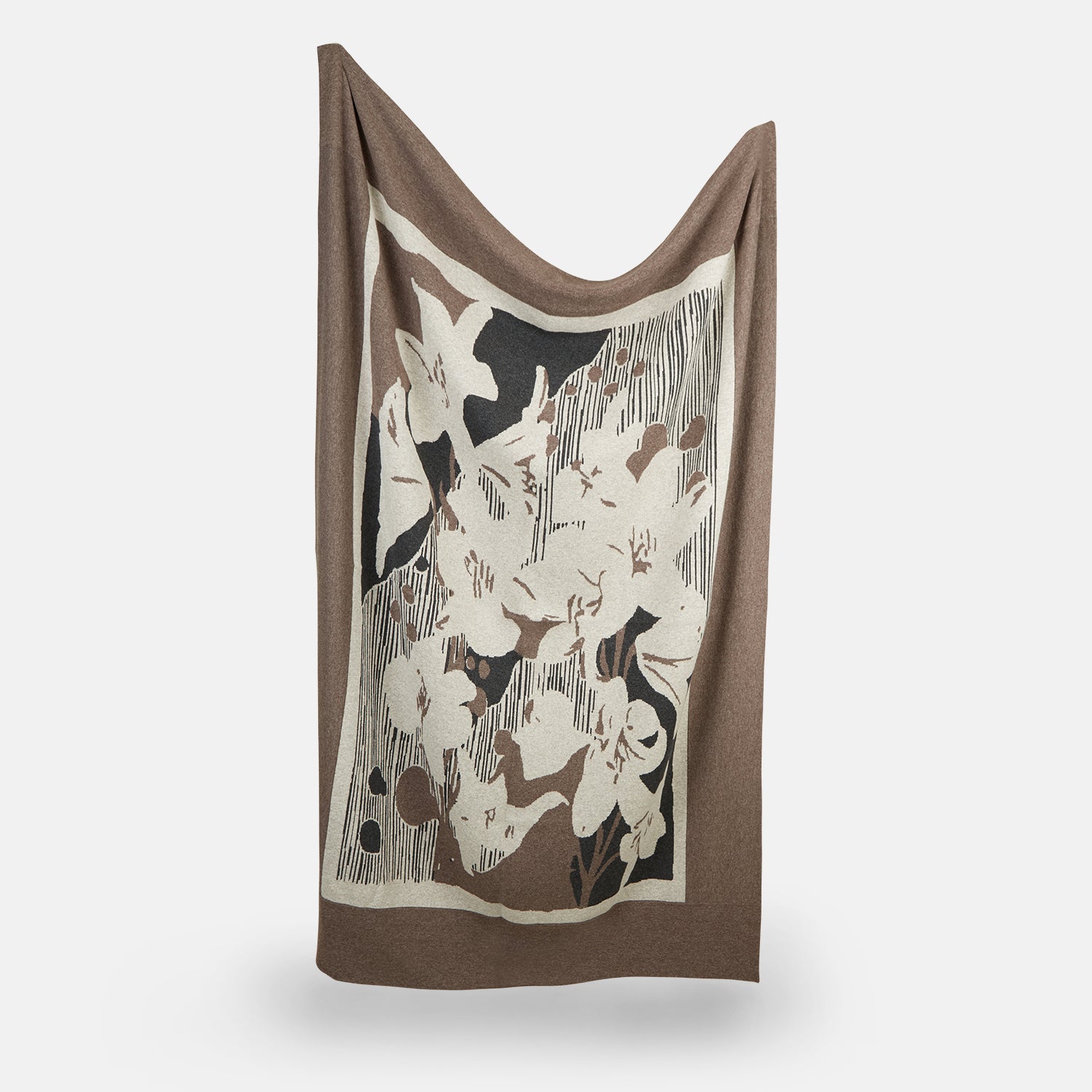 View 2 of product The Grey Wool And Cashmere Lily Blanket by Turnbull & Asser features an abstract animal outline in brown, beige, and dark grey on white. Expertly hand-finished, this folded blanket blends wool and cashmere for a luxurious touch.