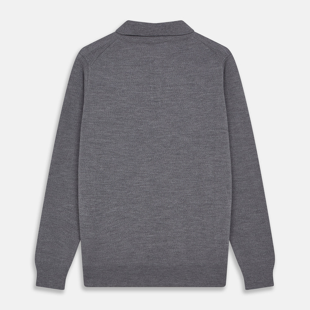 The Grey Merino Wool Cecil Rugby Polo Shirt by Turnbull & Asser features long sleeves, a collar, three-button placket, and ribbed hem and cuffs—an elevated menswear staple shown flat on a white background.