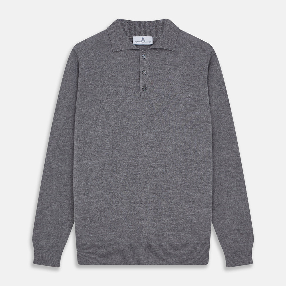 The Grey Merino Wool Cecil Rugby Polo Shirt by Turnbull & Asser features long sleeves, a collar, three-button placket, and ribbed hem and cuffs—an elevated menswear staple shown flat on a white background.