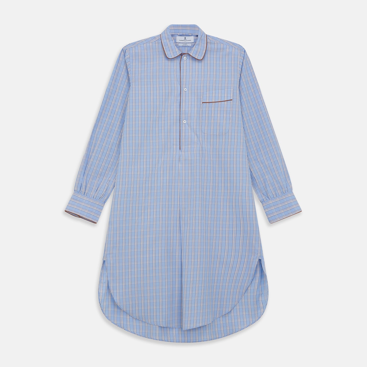 View 1 of product The Turnbull & Asser Pale Blue Multi Check Cotton Sussex Nightshirt features a classic plaid pattern, brown piping accents, button-down front, chest pocket, and curved hem—a timeless long-sleeve sleepwear essential.