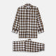 The Turnbull & Asser Brown Multi Check Linen Hyde Pyjama Set features a button-up, long-sleeve top and pants with a brown, black, and white plaid pattern, shown on a white background.