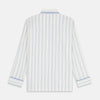 View 7 of product The Turnbull & Asser Women's Blue Multi Cotton Thelma Pyjama Set features a long-sleeve button-up shirt with collar and pocket, plus matching drawstring pants, elegantly displayed against a white background.
