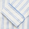 View 3 of product The Turnbull & Asser Women's Blue Multi Cotton Thelma Pyjama Set features a long-sleeve button-up shirt with collar and pocket, plus matching drawstring pants, elegantly displayed against a white background.