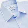 View 2 of product The Turnbull & Asser Pale Blue Multi Stripe Cotton Regular Fit Whitby Shirt features long sleeves, a classic collar, and buttoned cuffs, shown laid flat on a white background.