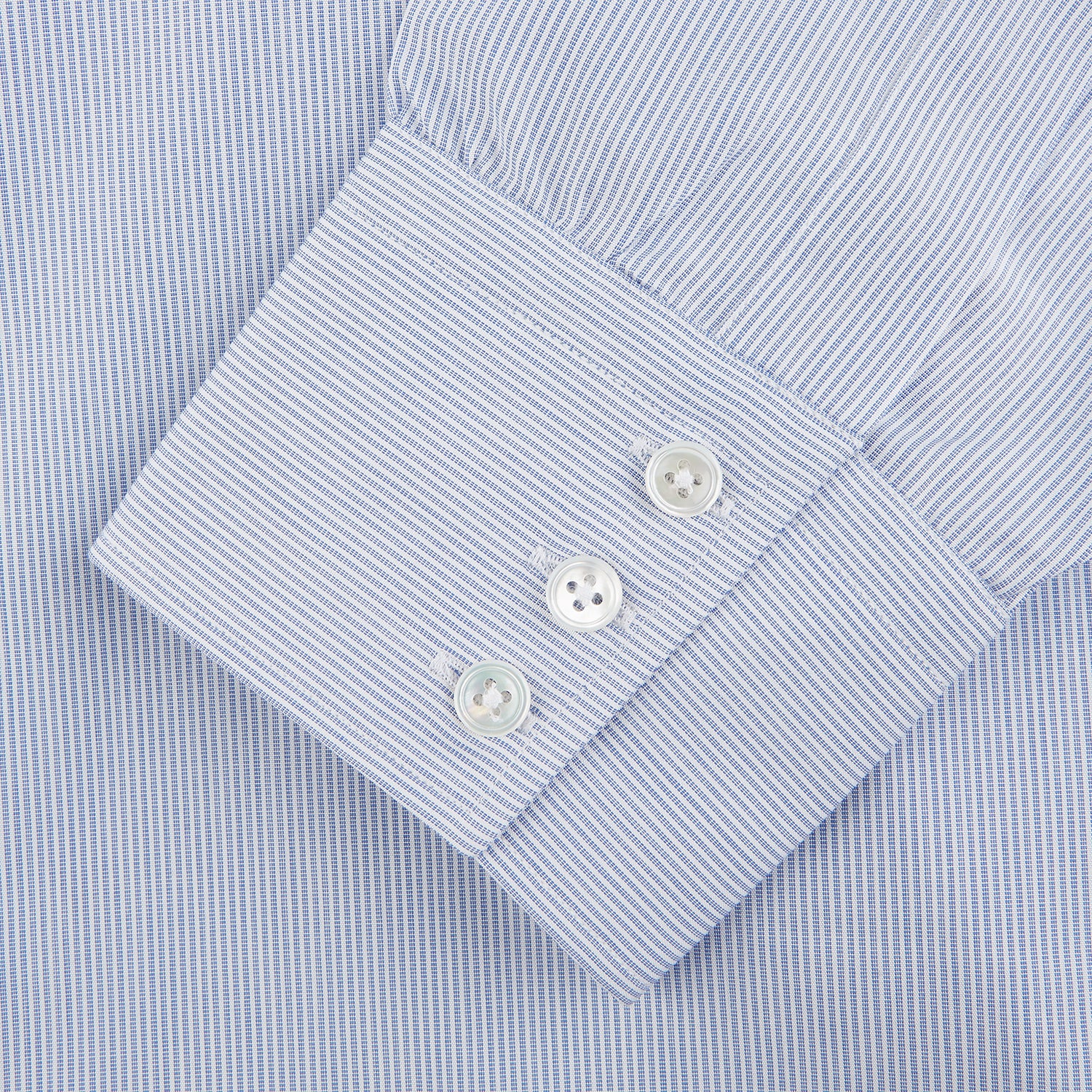 View 2 of product The Turnbull & Asser Blue and White Stripe Cotton Regular Fit Mayfair Shirt features long sleeves, a T&A collar, white buttons, and buttoned cuffs, displayed flat on a white background.