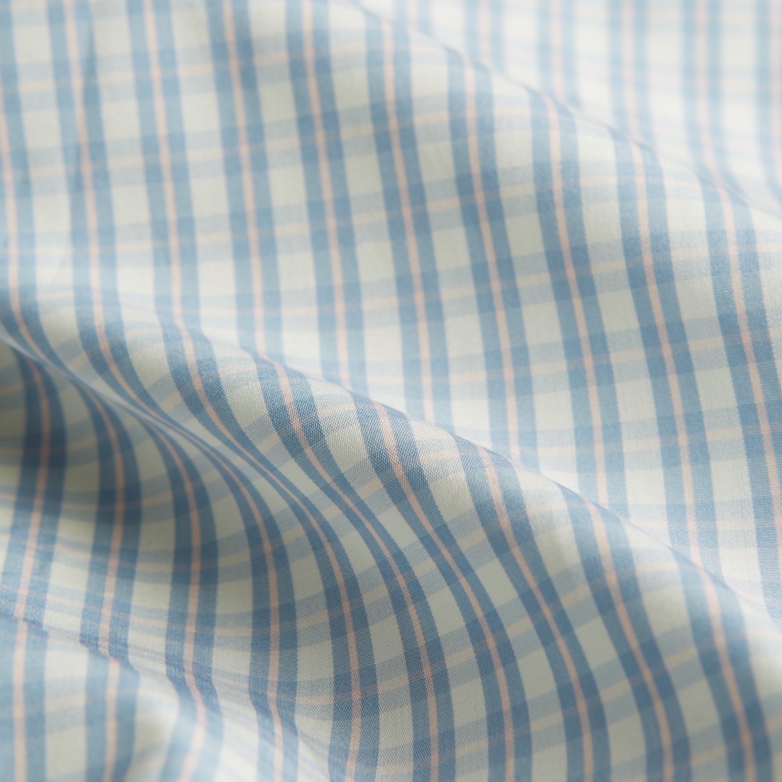 View 4 of product The Turnbull & Asser Pale Blue Multi Check Cotton Regular Fit Mayfair Shirt features long sleeves and a button-up front, displayed against a plain white background.
