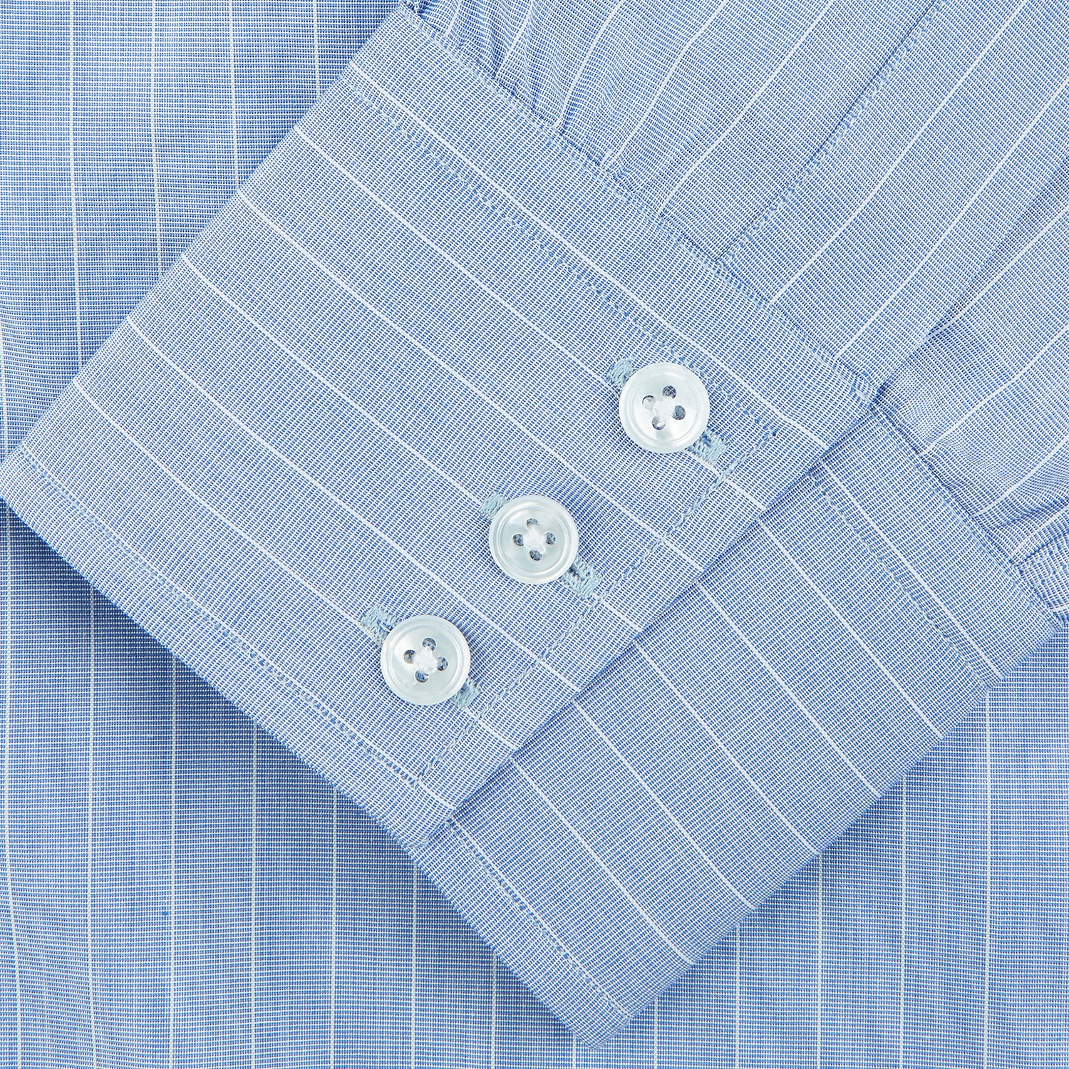 View 4 of product Navy Turnbull & Asser Mayfair shirt in textured cotton, regular fit with a sharp T&A collar and white buttons, laid flat on a white background.