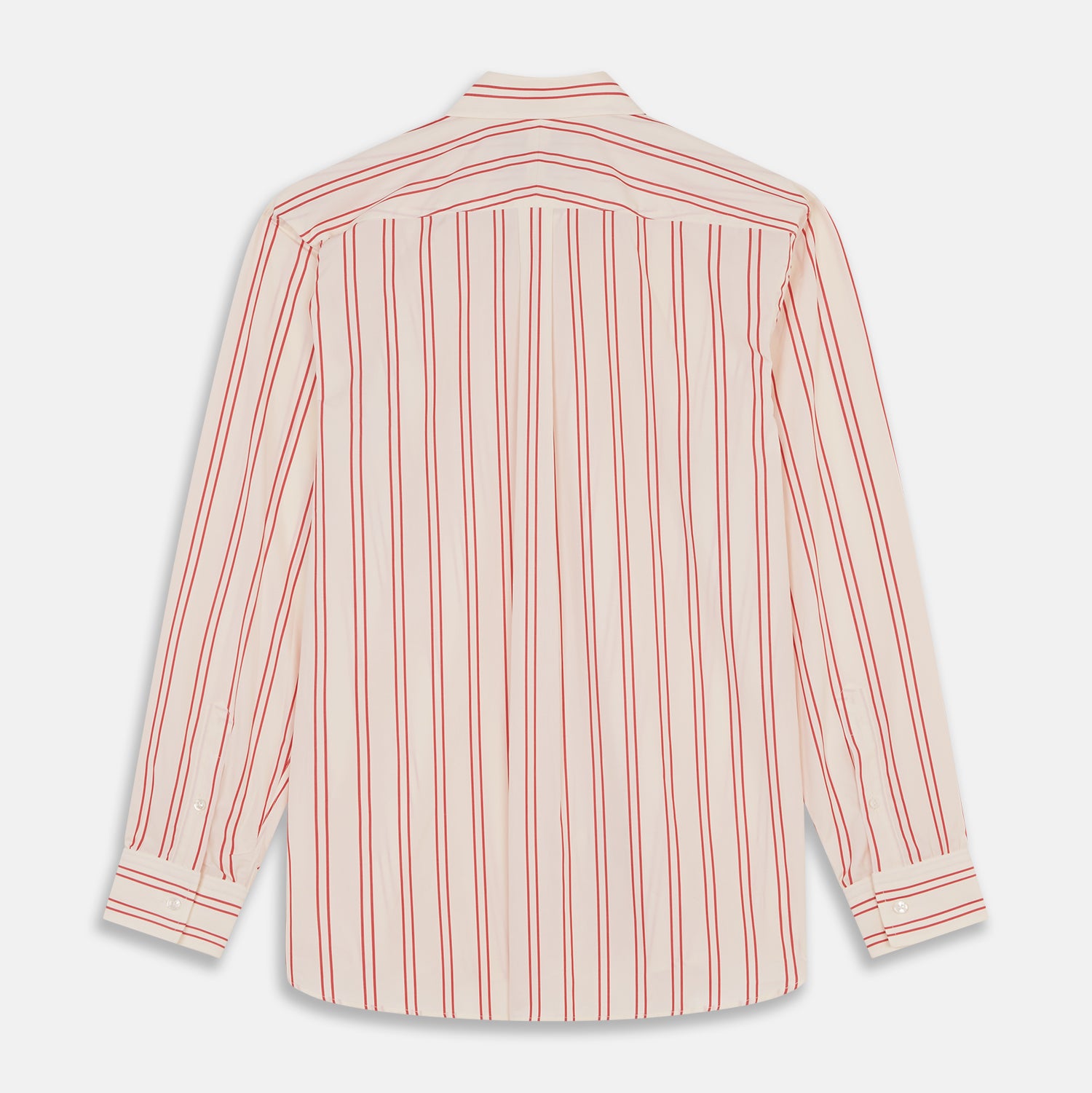 View 6 of product A man poses against a beige backdrop in the Turnbull & Asser Red and Off-White Stripe Cotton Weekend Fit Finch Shirt, styled with dark blue jeans and a brown belt for a timeless look. One hand rests in his pocket as he faces slightly to the side.