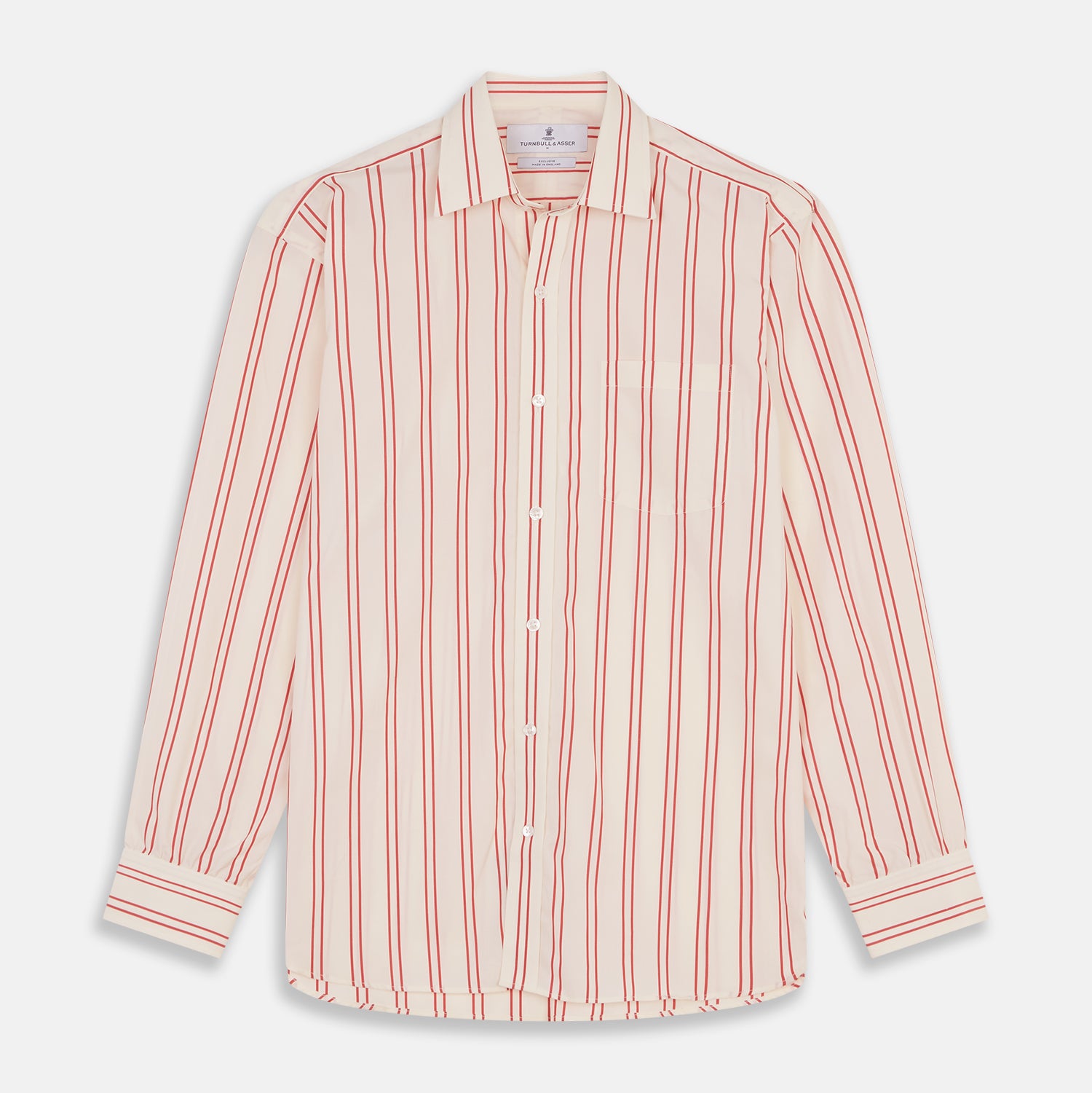 View 2 of product A man poses against a beige backdrop in the Turnbull & Asser Red and Off-White Stripe Cotton Weekend Fit Finch Shirt, styled with dark blue jeans and a brown belt for a timeless look. One hand rests in his pocket as he faces slightly to the side.