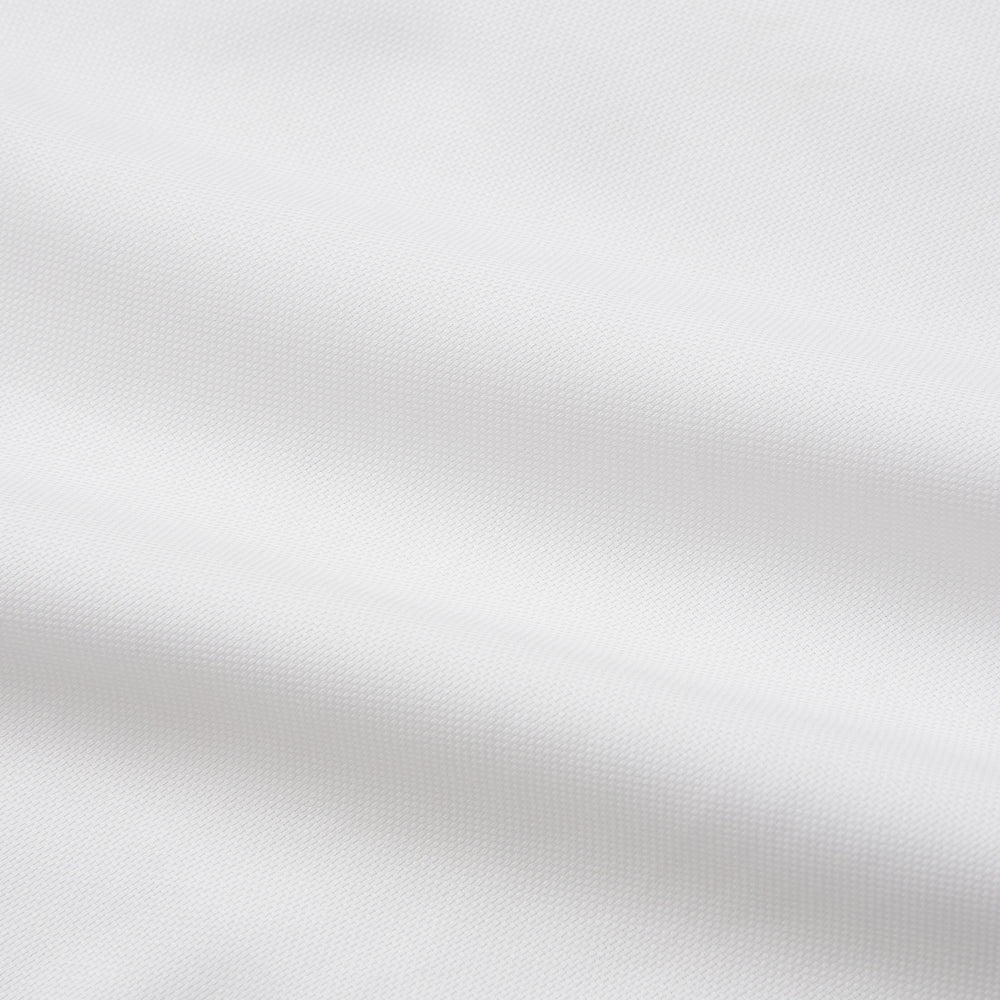 The Turnbull & Asser White Cotton Voile Weekend Fit Nevis Shirt features a Dorset button-down collar, two chest pockets, and a subtle military-inspired design, shown against a plain white background.
