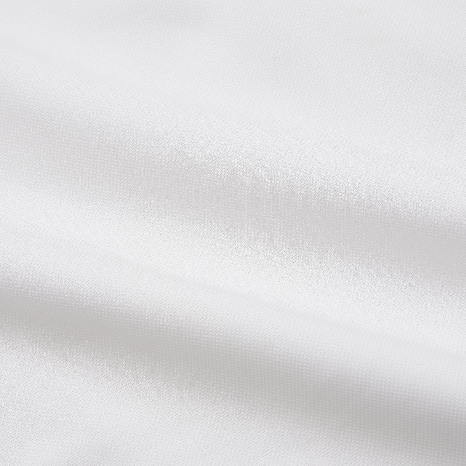View 4 of product The Turnbull & Asser White Cotton Voile Weekend Fit Nevis Shirt features a Dorset button-down collar, two chest pockets, and a subtle military-inspired design, shown against a plain white background.