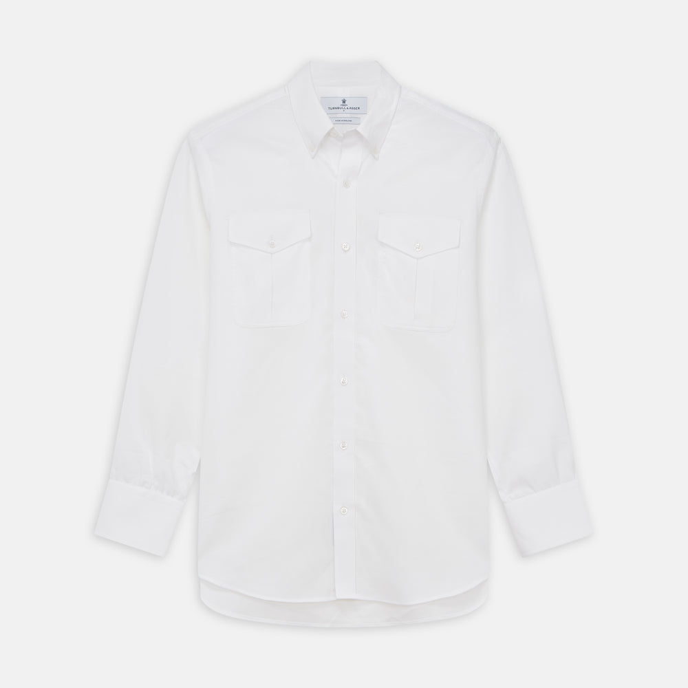 The Turnbull & Asser White Cotton Voile Weekend Fit Nevis Shirt features a Dorset button-down collar, two chest pockets, and a subtle military-inspired design, shown against a plain white background.