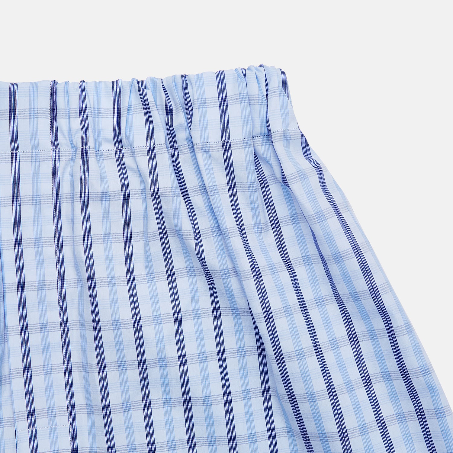View 2 of product Turnbull & Asser Blue Multi Check Cotton Godfrey Boxer Shorts, shown flat on a white background. These boxers feature an elastic waistband and bring comfort and luxury to any man’s underwear collection.