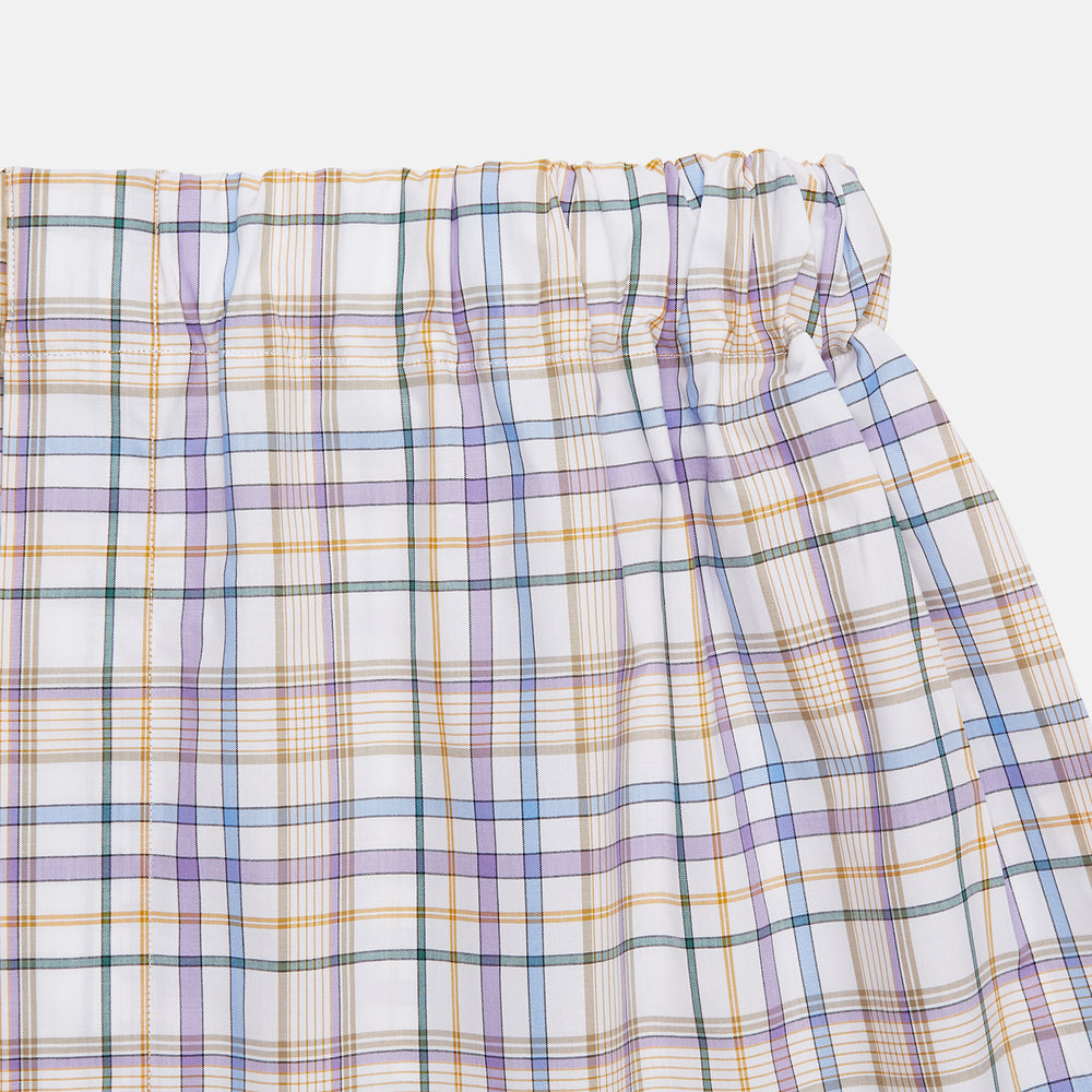 The Turnbull & Asser Colourful Garden Multi Check Cotton Godfrey Boxer Shorts feature a relaxed fit and elastic waistband, showcasing vibrant blue, red, and yellow plaid on white—ideal luxury underwear for men.