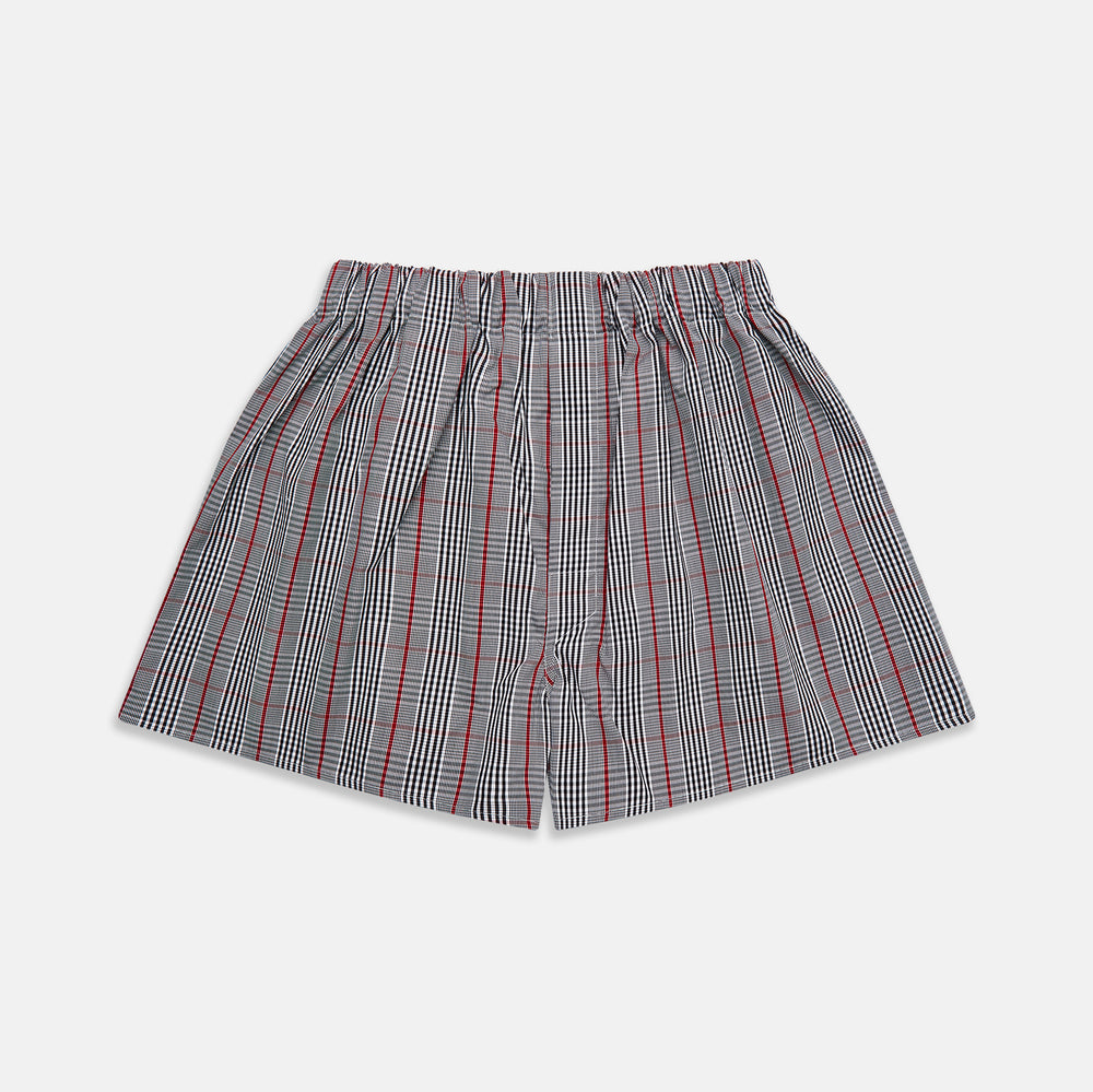 Black Prince of Wales check cotton Godfrey boxer shorts by Turnbull & Asser, featuring a loose fit and elastic waistband in a classic checkered design, displayed flat on a white background.