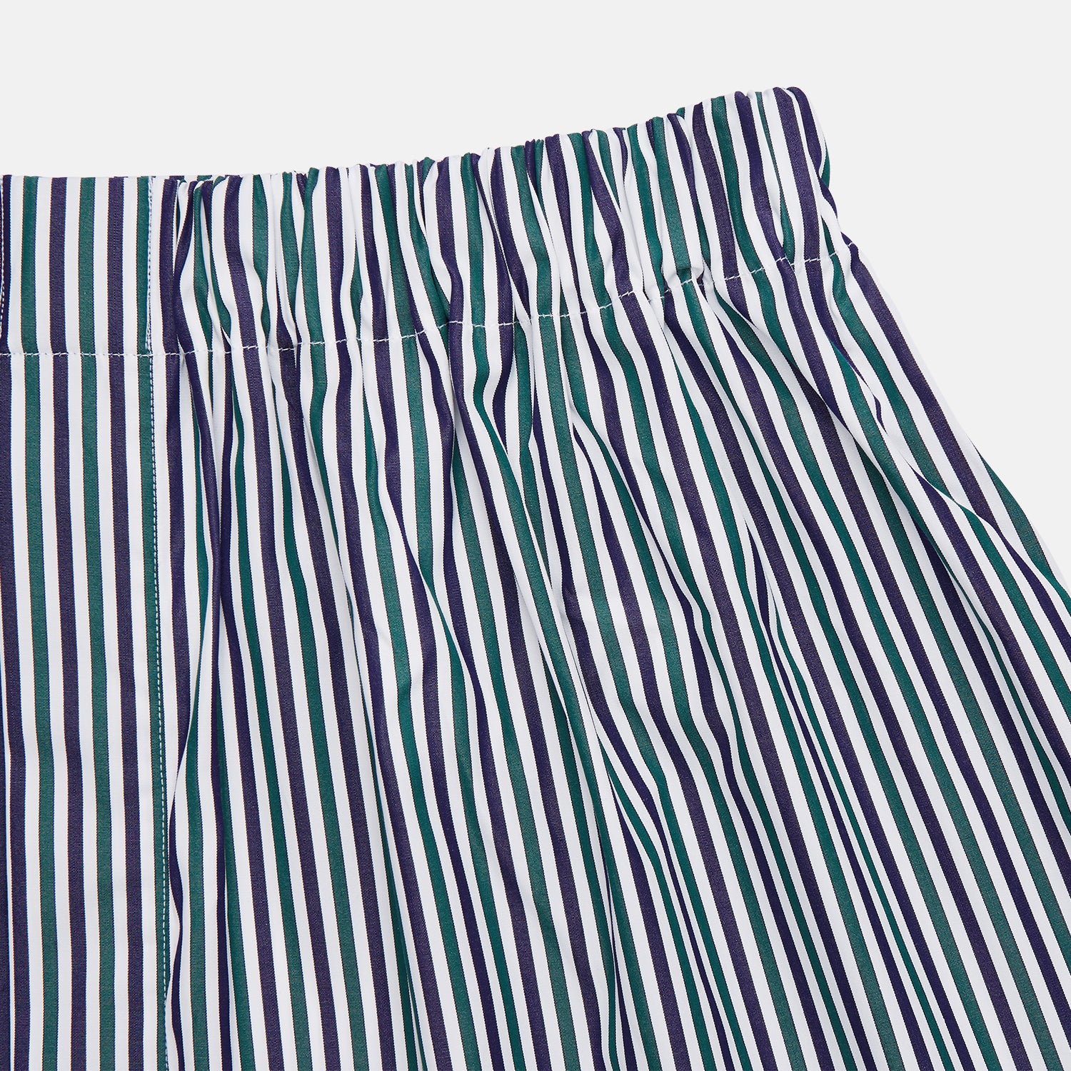 View 2 of product Turnbull & Asser Green and Blue Stripe Cotton Godfrey Boxer Shorts for men shown flat on a white background, featuring an elastic waistband and no visible pockets or buttons.