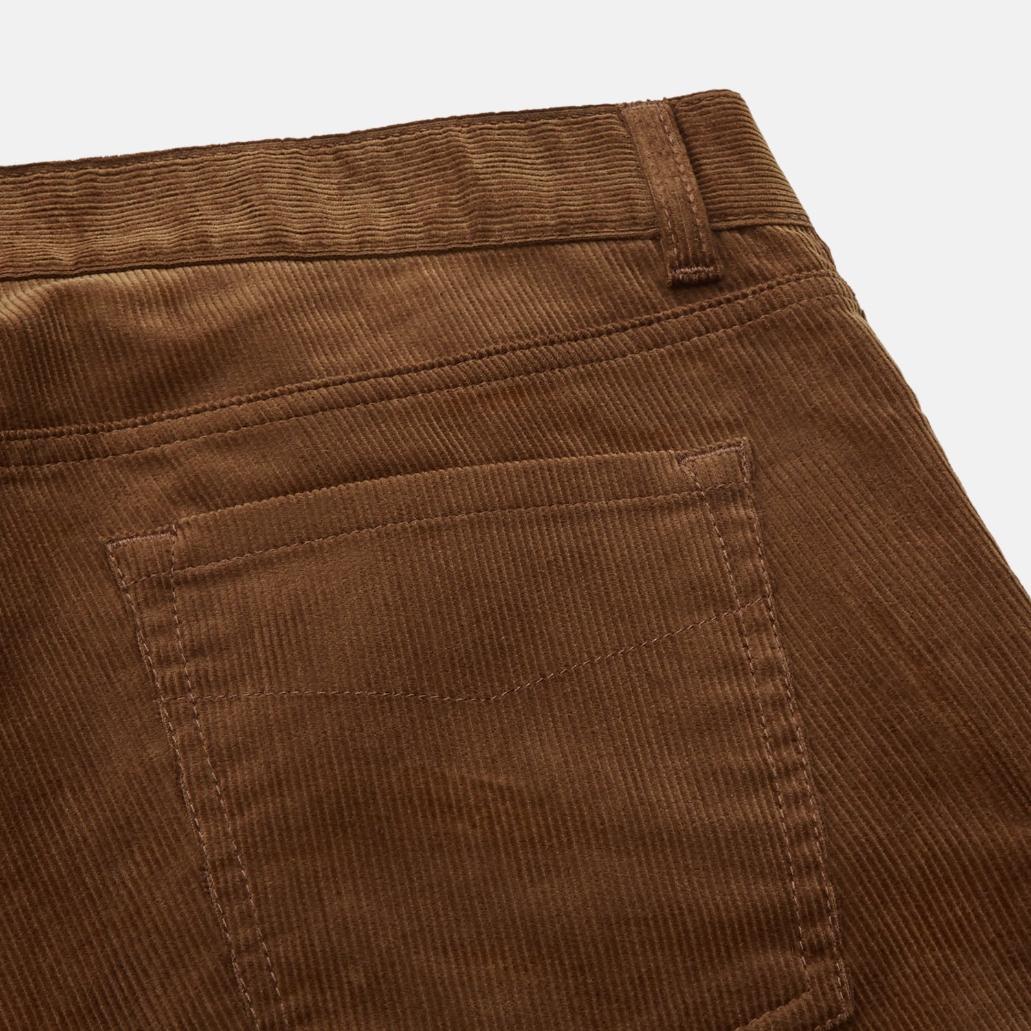 View 2 of product The Brown Cord Mylo Trousers by Turnbull & Asser are casual, straight-leg pants with a classic five-pocket design, shown here in brown corduroy against a white background—ideal for highlighting autumnal style.