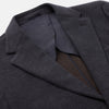 View 2 of product A menswear classic, the Turnbull & Asser Navy Cashmere Blend Henley Blazer features notch lapels, partial lining, two front buttons, and three patch pockets, shown flat on a white background.