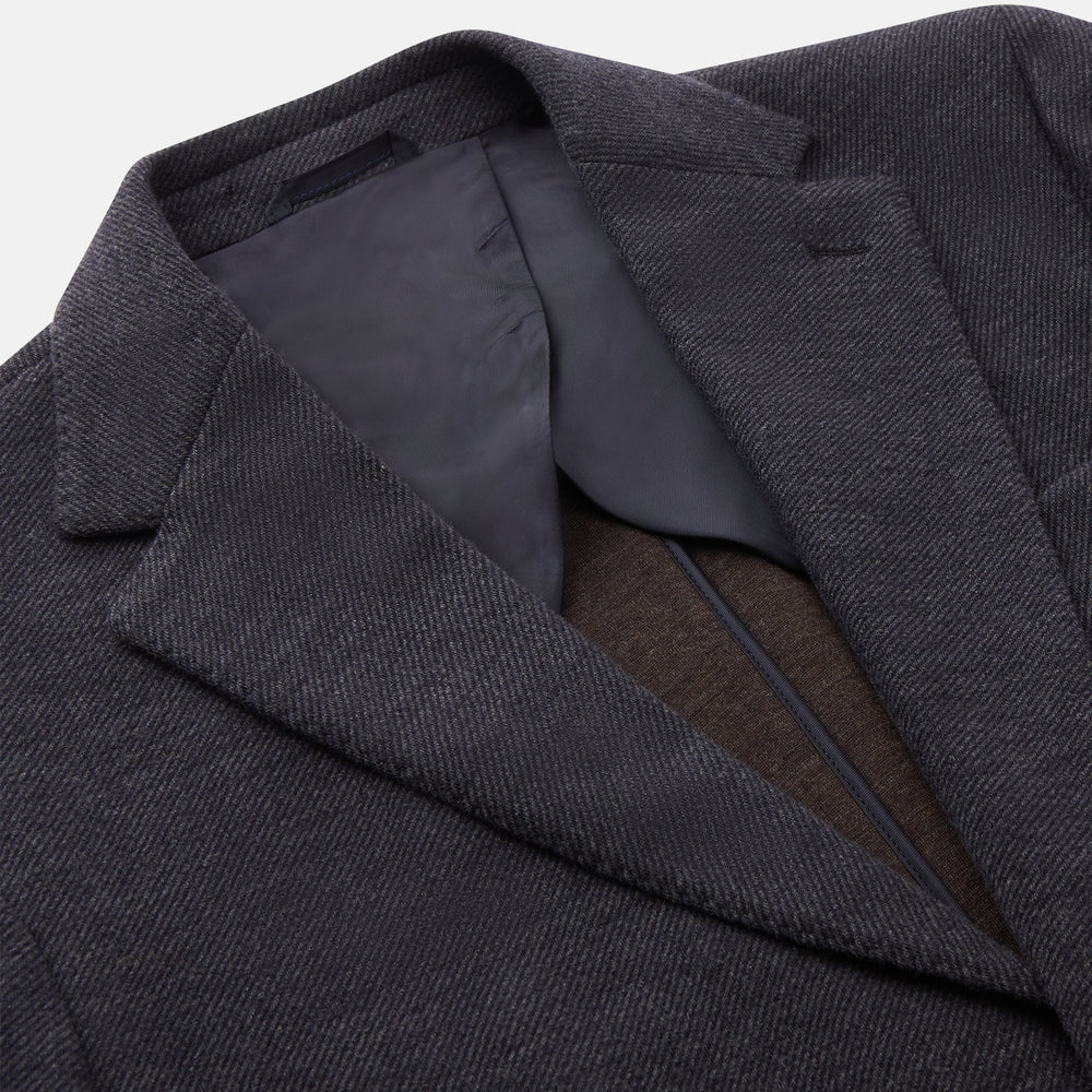 A menswear classic, the Turnbull & Asser Navy Cashmere Blend Henley Blazer features notch lapels, partial lining, two front buttons, and three patch pockets, shown flat on a white background.