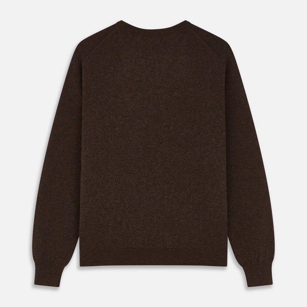 The Turnbull & Asser Brown Cashmere Glenn Jumper is a classic menswear piece with a crew neck and ribbed cuffs, collar, and hem. It’s laid flat on a white background, showcasing its timeless long-sleeved design.
