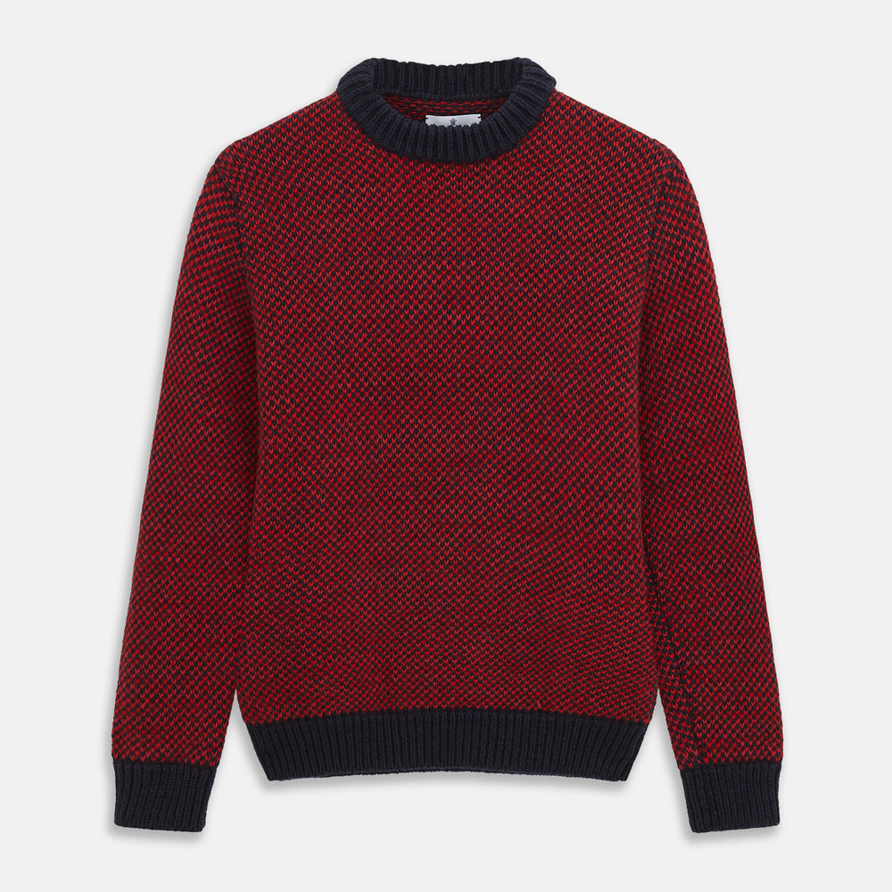 The Turnbull & Asser Red and Navy Wool Blend Billy Jumper features a red knit body with navy ribbed collar, cuffs, and hem, made from a wool and cotton blend, shown on a white background.