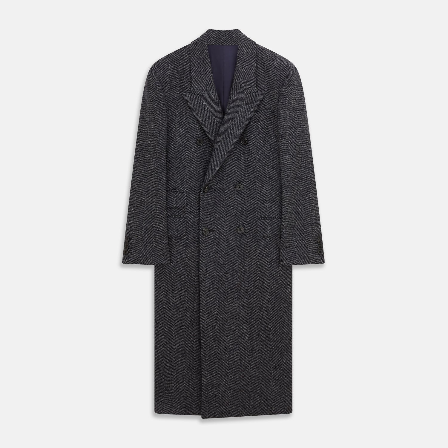 View 1 of product The Grey Herringbone Wool Double Breasted Highgrove Overcoat by Turnbull & Asser features black buttons, a notched lapel, and side pockets, shown against a plain white background.