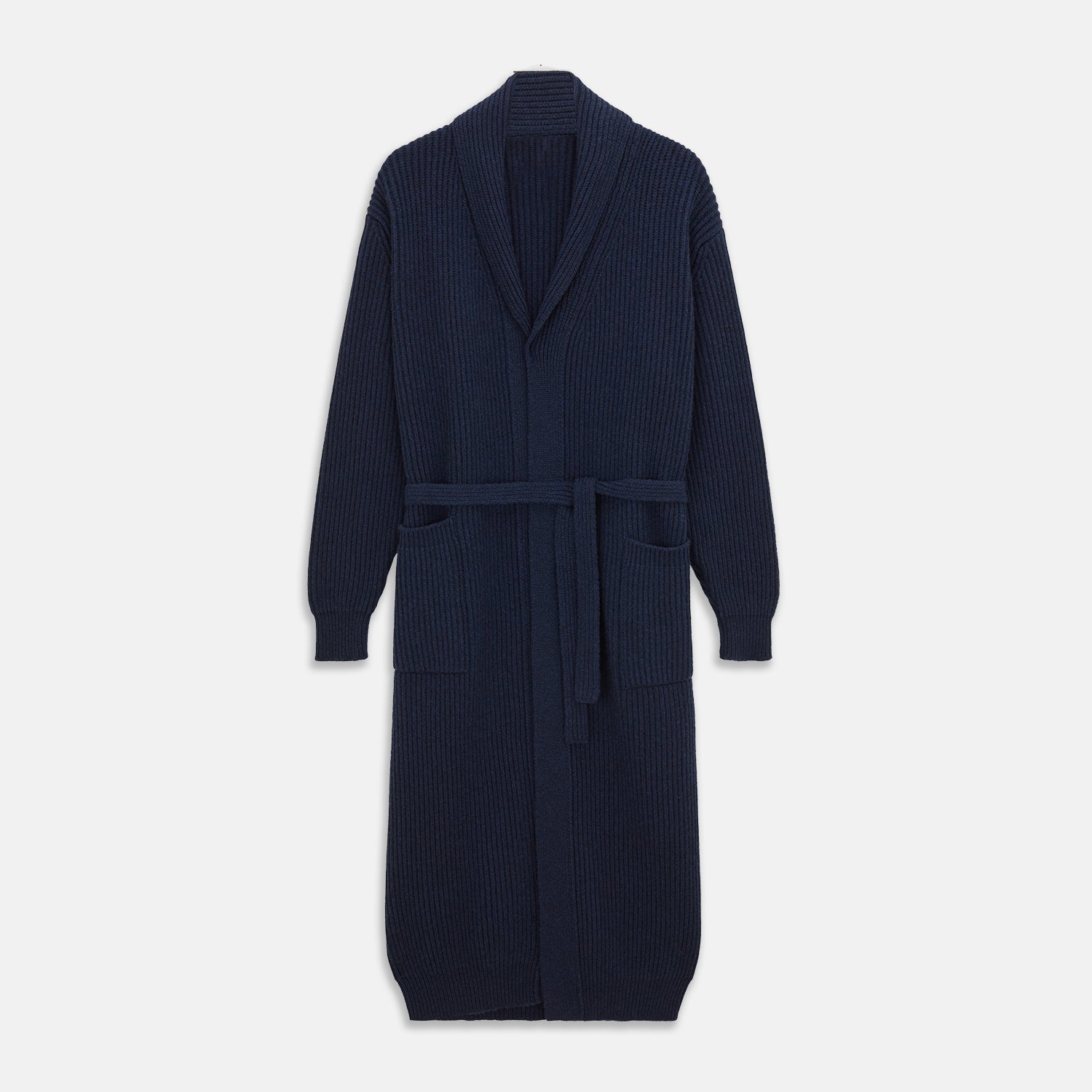 View 1 of product The Deep Navy Cashmere Baldwin Gown by Turnbull & Asser features a ribbed knit, long sleeves, shawl collar, two front pockets, and a waist tie—ideal as luxury loungewear or a chic navy dressing gown.