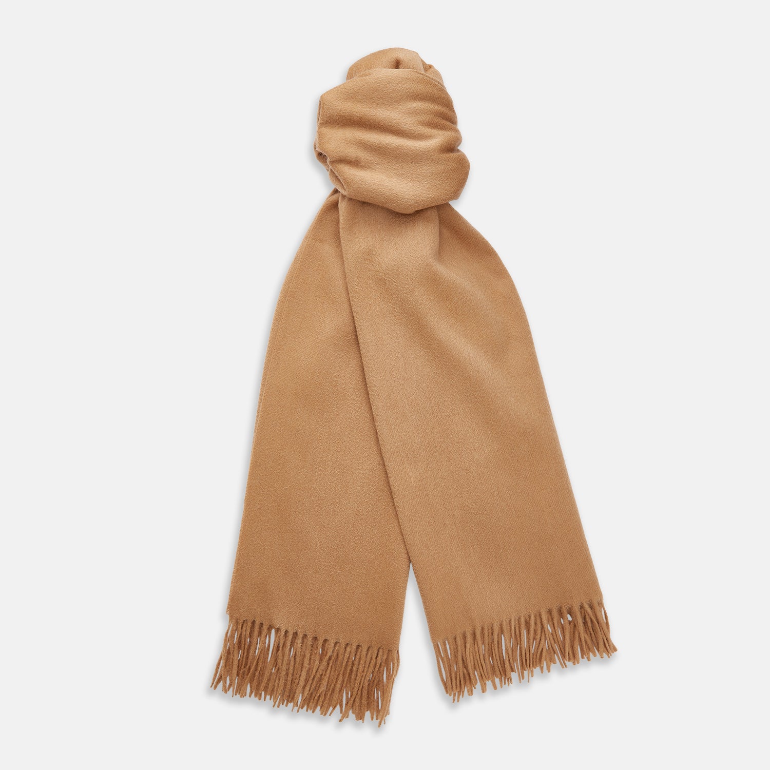 View 1 of product The Turnbull & Asser Camel Brown Cashmere Scarf features soft cashmere and fringed ends, neatly folded on a white background—an essential winter accessory.