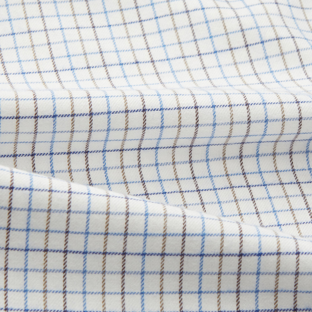 The Turnbull & Asser Blue Tattersall Check Cashmerello Regular Fit Mayfair Shirt is a long-sleeve button-up with a collar and chest pocket, featuring a white base and blue checks, shown laid flat on a white background.