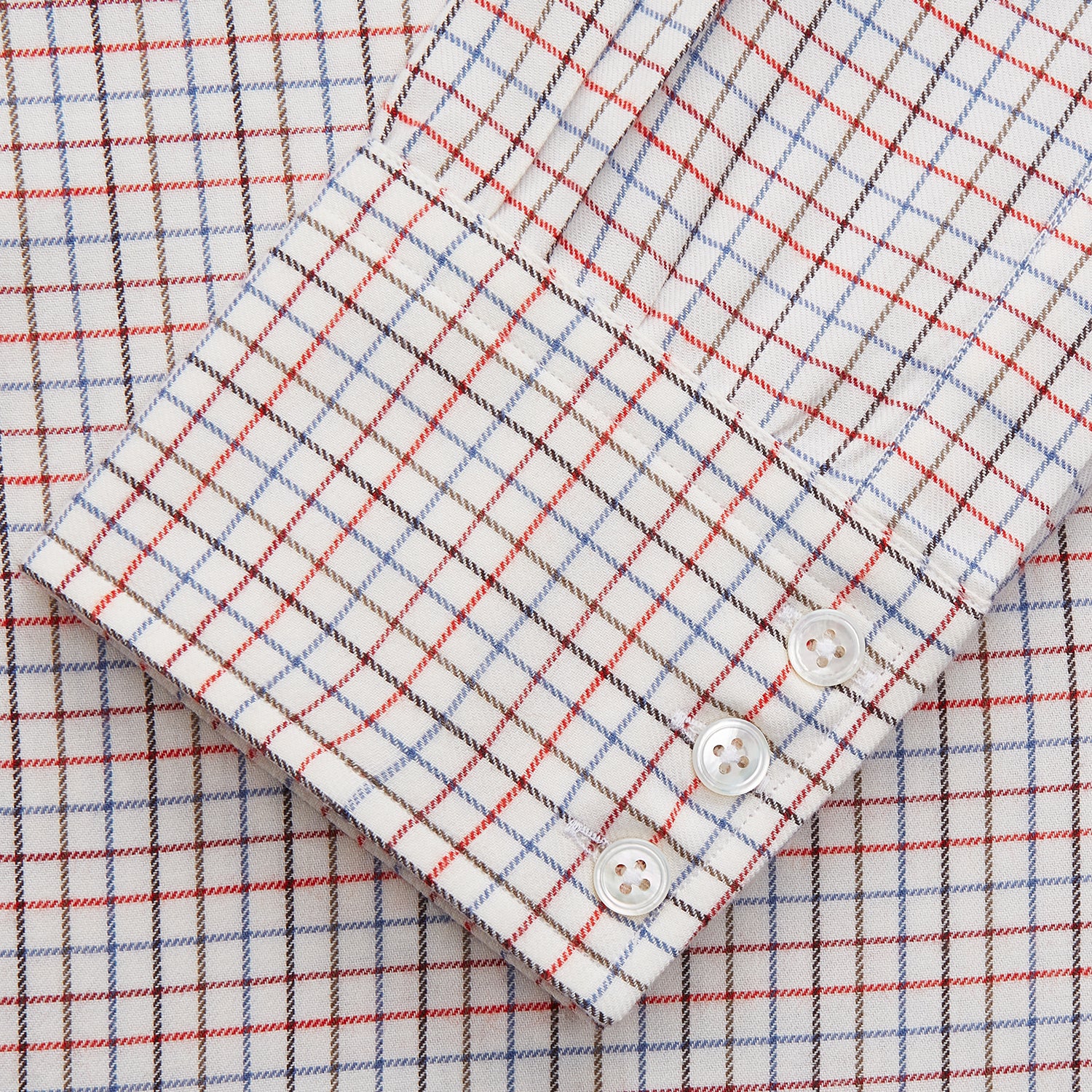 View 2 of product The Pink Tattersall Check Cashmerello Regular Fit Mayfair Shirt by Turnbull & Asser features a T&A collar and a red, blue, and white check pattern. The long-sleeve shirt is displayed flat against a white background.