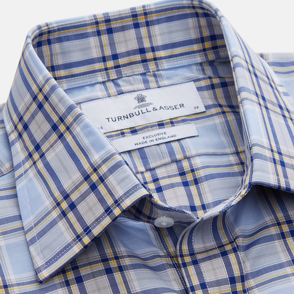 The Turnbull & Asser Blue and Yellow Check Cotton Regular Fit Mayfair Shirt for men is displayed laid flat on a white background.