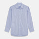 The Blue and Navy Halo Stripe Cotton Regular Fit Mayfair Shirt by Turnbull & Asser features classic styling with vertical stripes, a button-up front, and cuffed sleeves—an essential men's wardrobe piece.