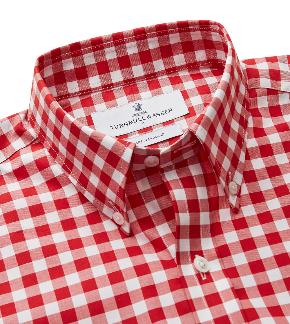 The Turnbull & Asser Burgundy Multi Check Cotton Weekend Fit Hayne Shirt is a long-sleeve style with a Dorset collar and red-and-white gingham checks, shown laid flat on a white background.