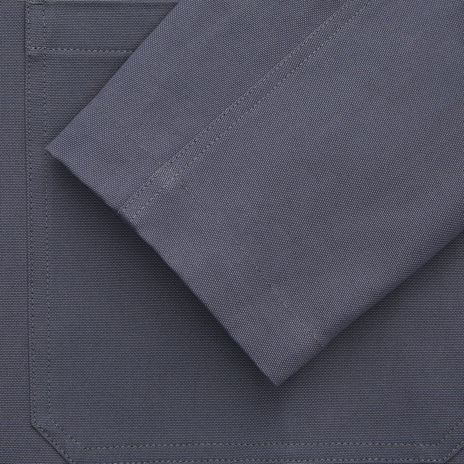 View 3 of product The Turnbull & Asser Charcoal Grey Organic Cotton Blend Remy Chore Jacket features a collar, button-up front, and four front pockets—two chest, two waist—making it a versatile must-have for any men's wardrobe.