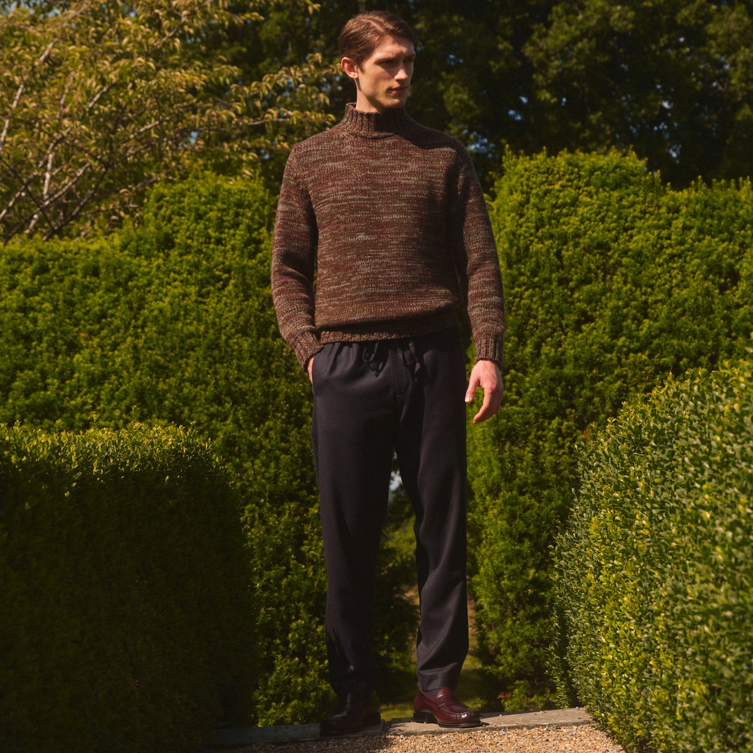 View 2 of product Turnbull & Asser Charcoal Tailored Drawstring Trousers in wool flannel, featuring an elastic waistband, straight legs, and side pockets, shown laid flat on a white background.