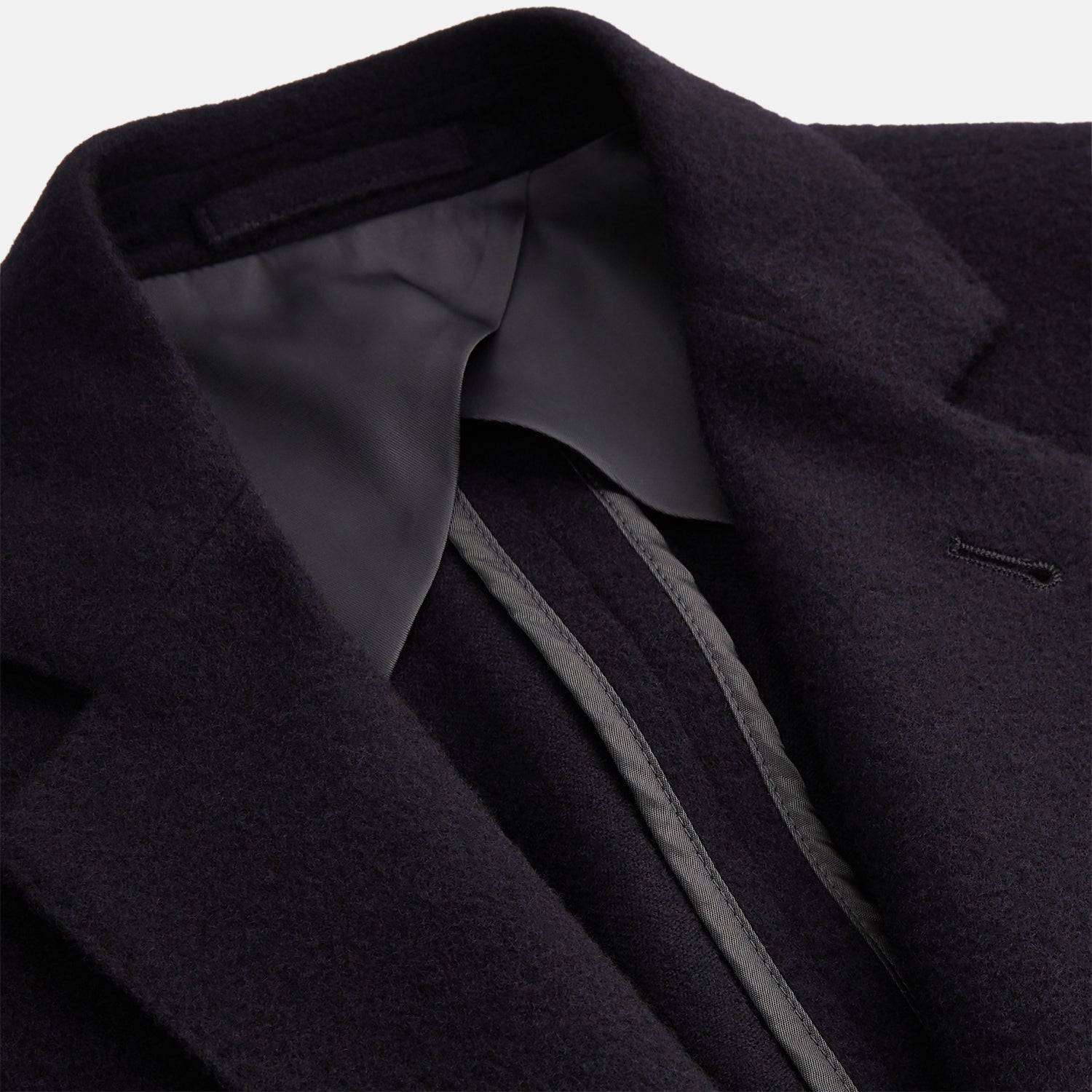 View 2 of product The Turnbull & Asser Navy Cashmere Bern Blazer features a notched lapel, two-button front, three front pockets, and cuff button details. Shown laid flat on a white background.