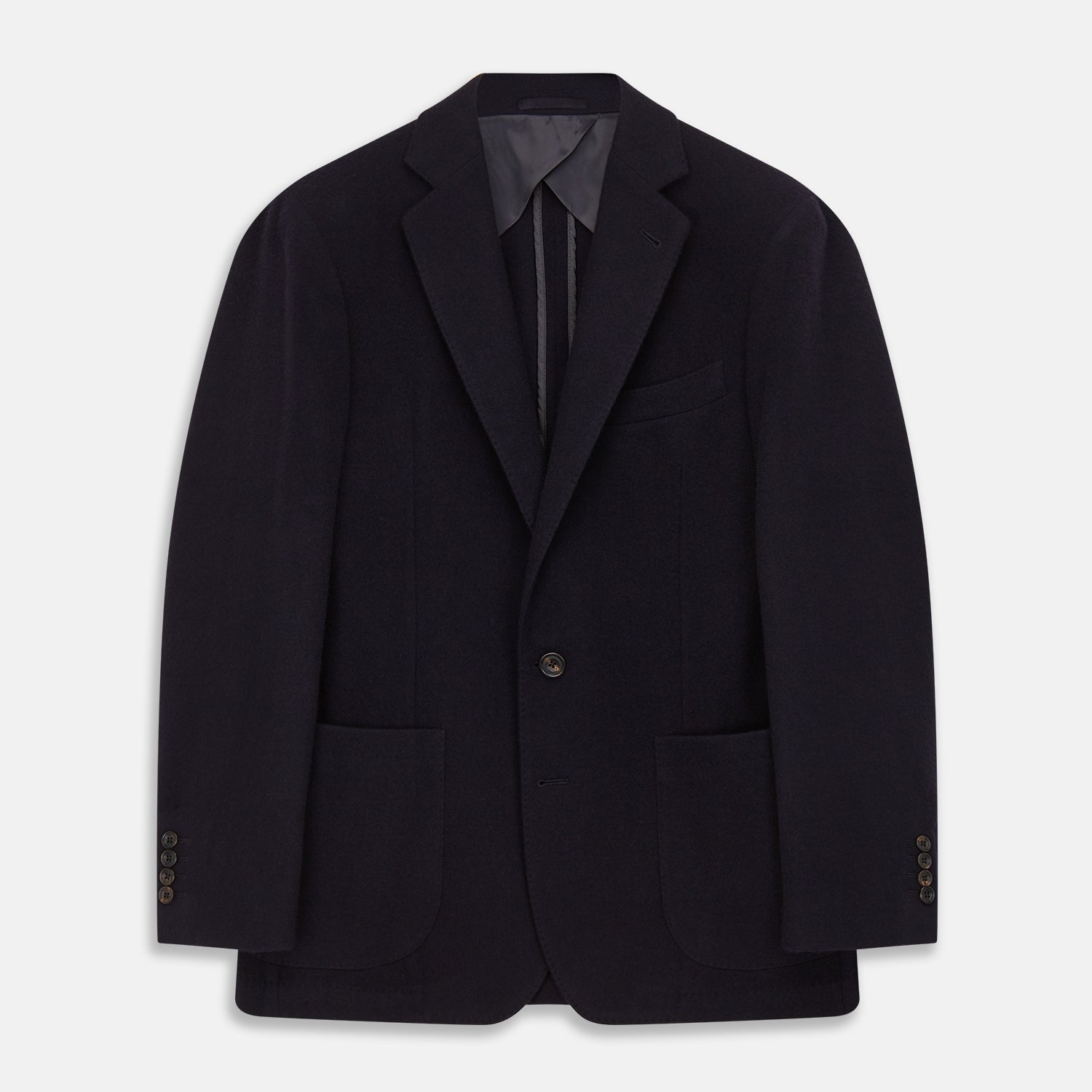 View 1 of product The Turnbull & Asser Navy Cashmere Bern Blazer features a notched lapel, two-button front, three front pockets, and cuff button details. Shown laid flat on a white background.