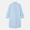 View 5 of product The Turnbull & Asser Light Blue Piped Cotton Nightshirt is a luxurious long-sleeve shirt dress with a pointed collar, black piping on the collar, cuffs, and chest pocket, button front closure, and curved hem.