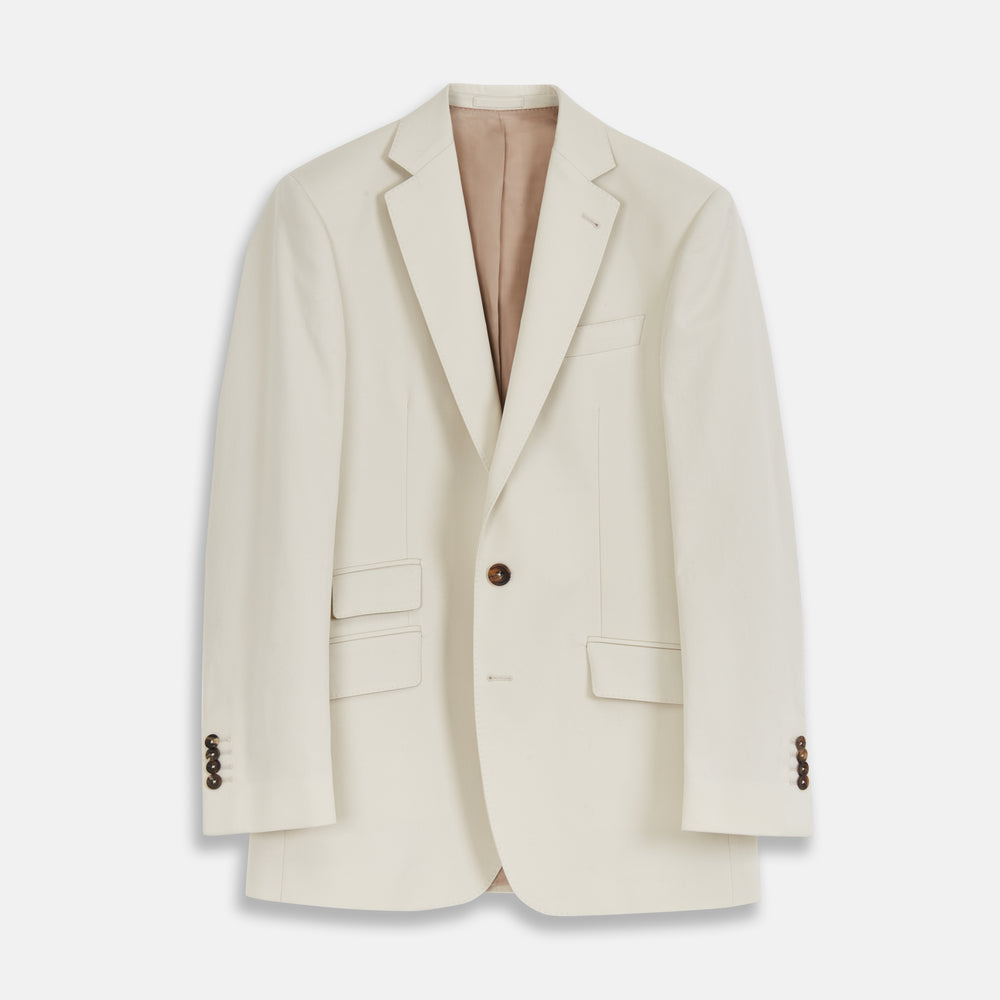 The Turnbull & Asser Stone Cotton Twill Jacket features a notch lapel, chest pocket, two front flap pockets, and brown buttons. Italian-tailored for smart-casual style, it is shown here against a white background.