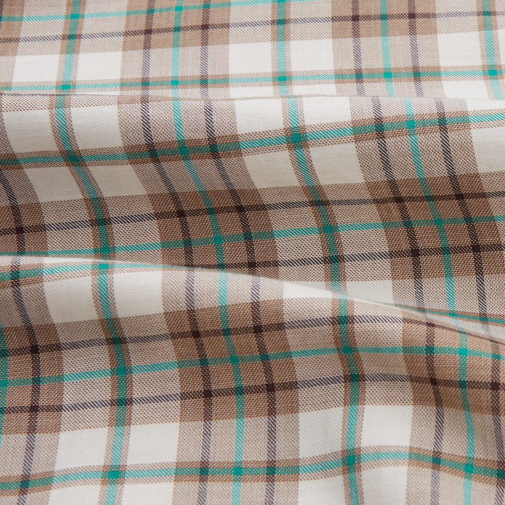 The Green and Oatmeal Cotton Hyde Pyjamas Set by Turnbull & Asser features a modern fit and comfortable drawstring waist trousers—perfect cotton sleepwear for relaxing nights.