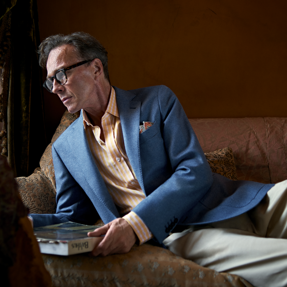 The Sky Blue Wool and Cashmere Jacket by Turnbull & Asser is single-breasted with two large front pockets, a notched lapel, and a single button closure. It is expertly tailored in Italy and displayed against a plain white background.