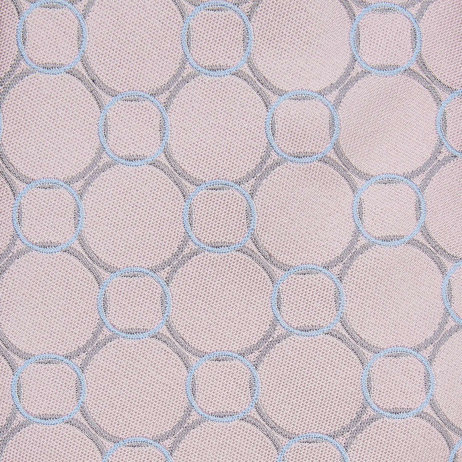 View 2 of product The Turnbull & Asser Baby Pink and Blue Circle Jacquard Silk Tie features a subtle geometric pattern, elegantly rolled against a plain white background.