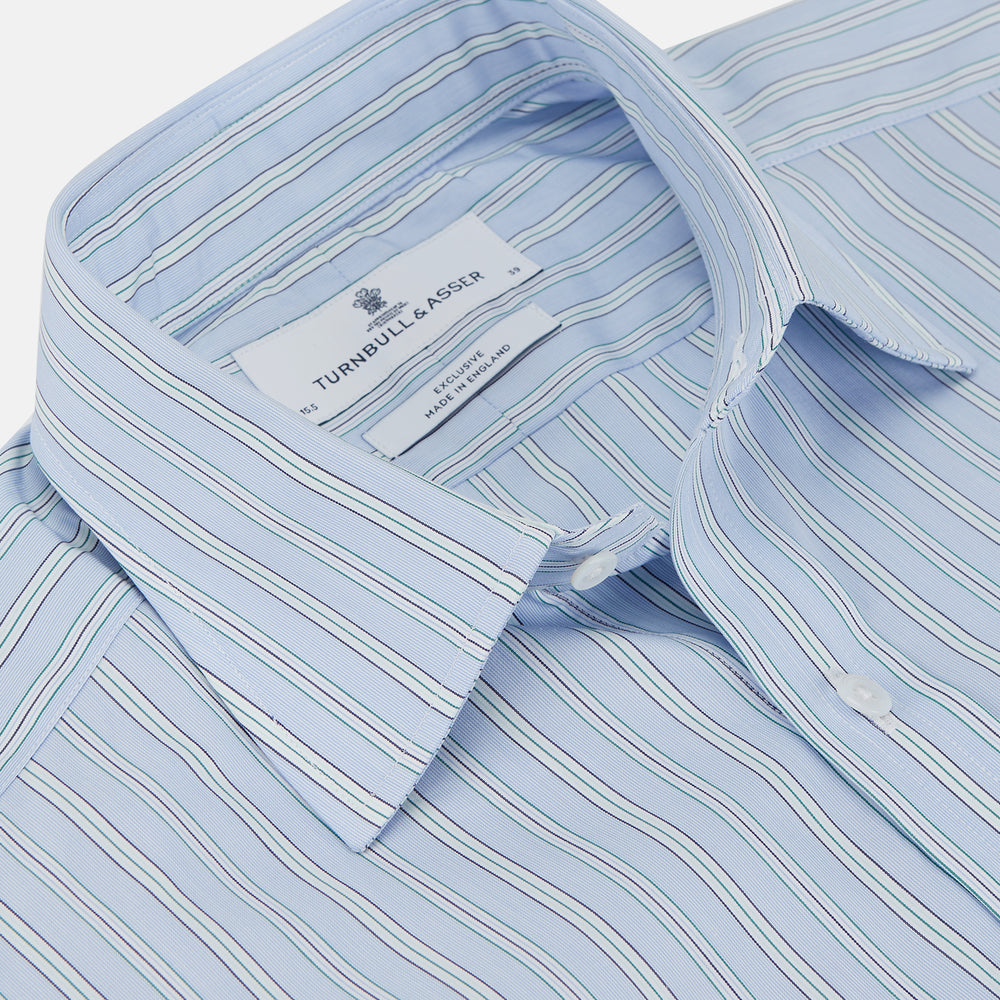 The Turnbull & Asser Blue and White Fine Stripe Shirt features a T&A collar, 3-button cuffs, and a regular fit with long sleeves—ideal for smart-casual looks, displayed against a plain white background.
