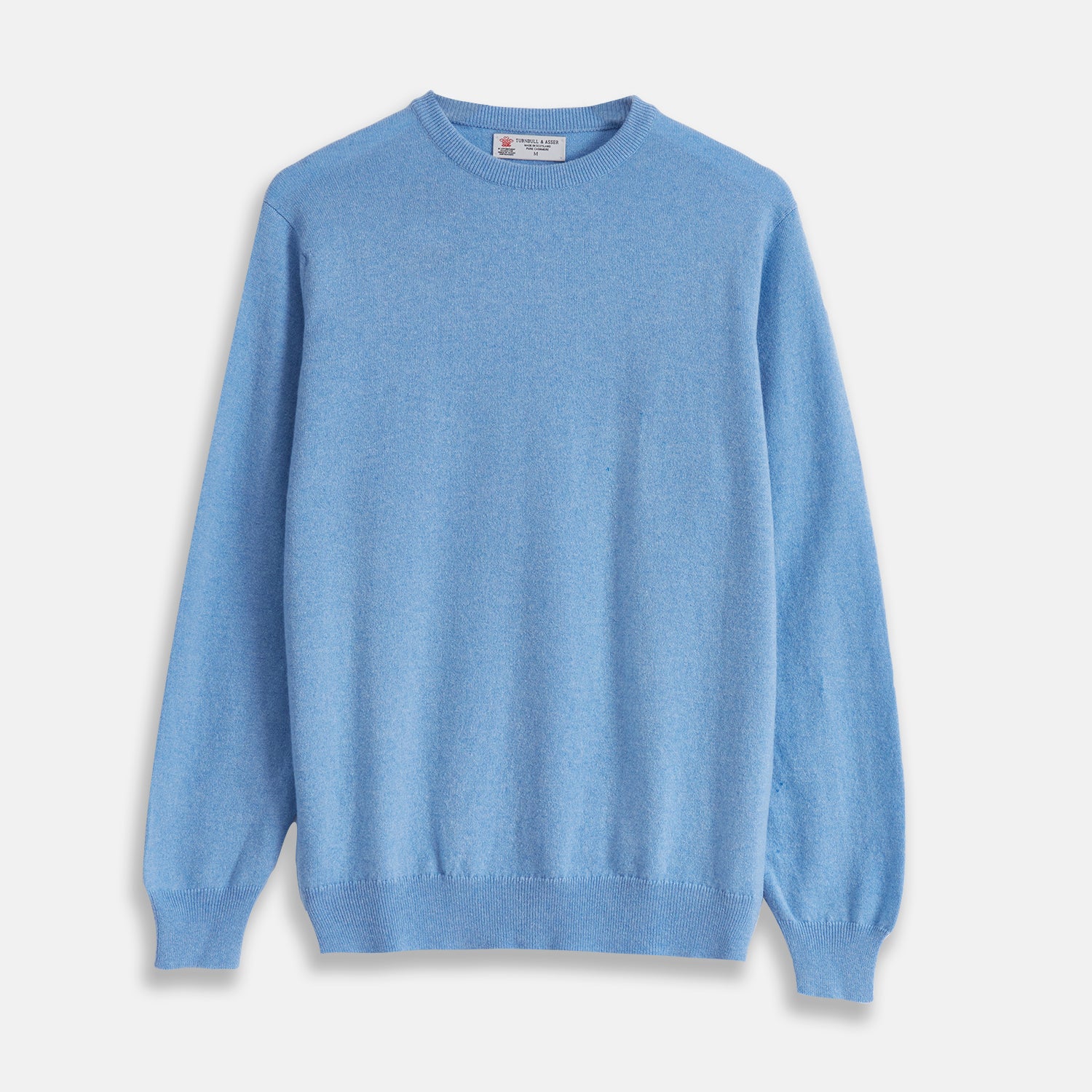 View 1 of product The Turnbull & Asser Sky Blue Fine Cashmere Crew Neck Jumper features long sleeves with ribbed cuffs and hem, shown against a plain white background.