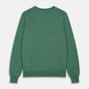 View 3 of product The Turnbull & Asser Green Cashmere Crewneck Jumper features long sleeves, ribbed cuffs, and a ribbed hem, shown laid flat on a white background.