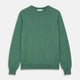 The Turnbull & Asser Green Cashmere Crewneck Jumper features long sleeves, ribbed cuffs, and a ribbed hem, shown laid flat on a white background.